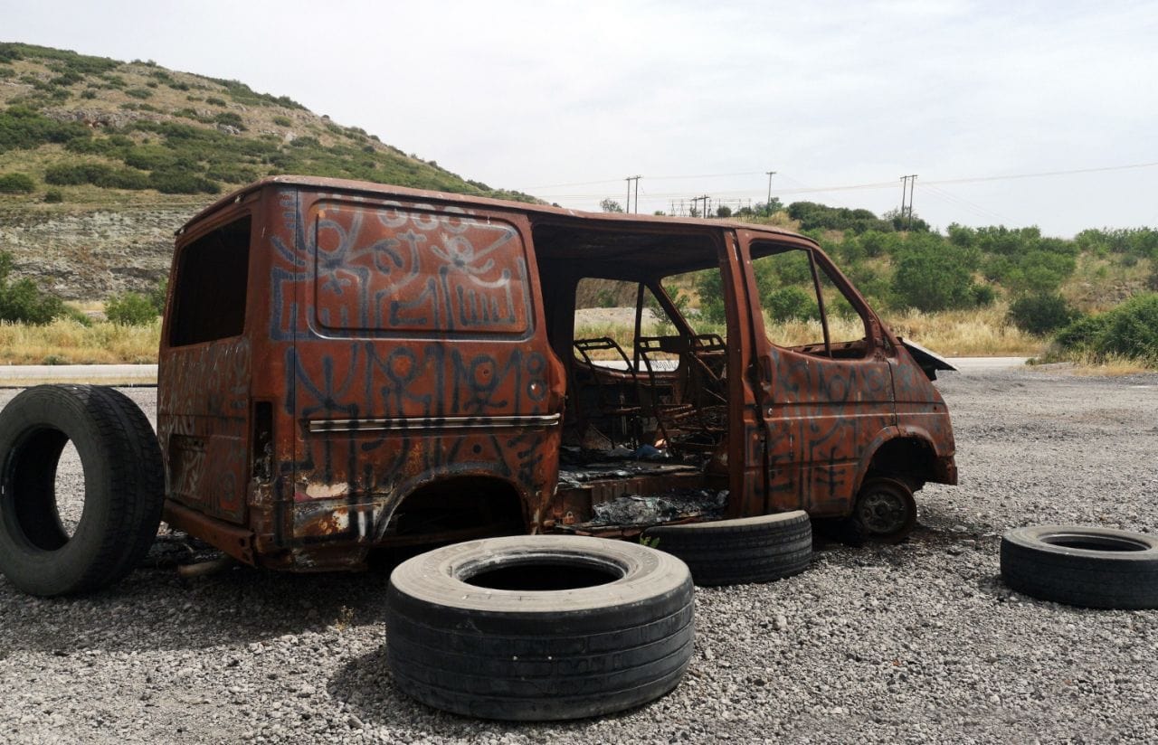 abandoned burnt out car